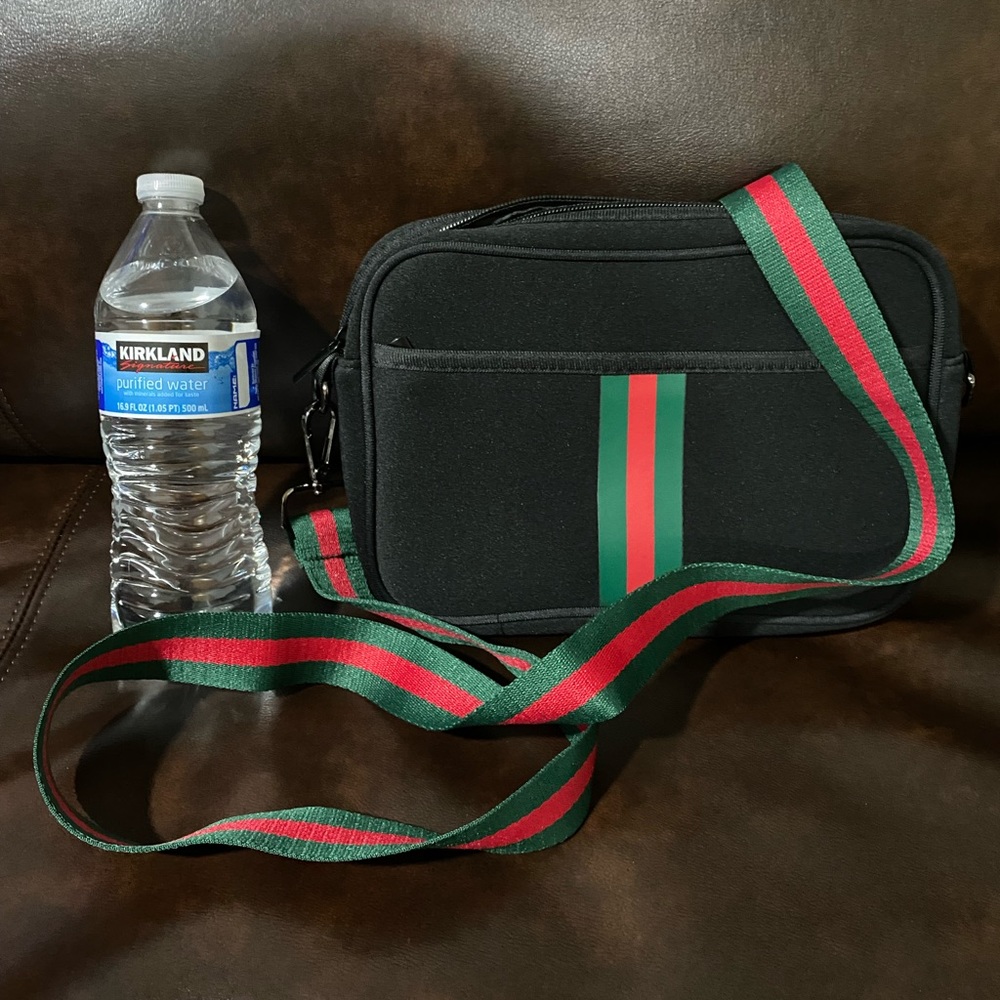Red/green strap black bag crossbody